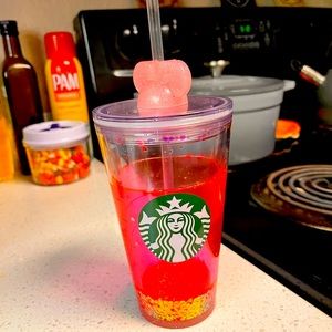 Grande size starbucks cup with Minnie Mouse ears topper